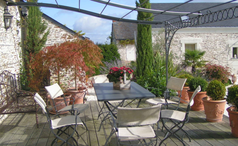 Terrasse en bois et pergolas forgée
